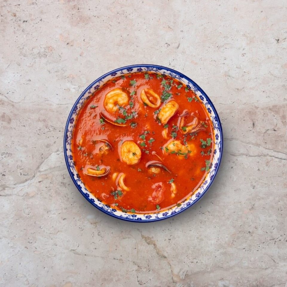 Nardò Italian Restaurant's seafood stew with shrimp, squid, and mussels in a rich tomato sauce.